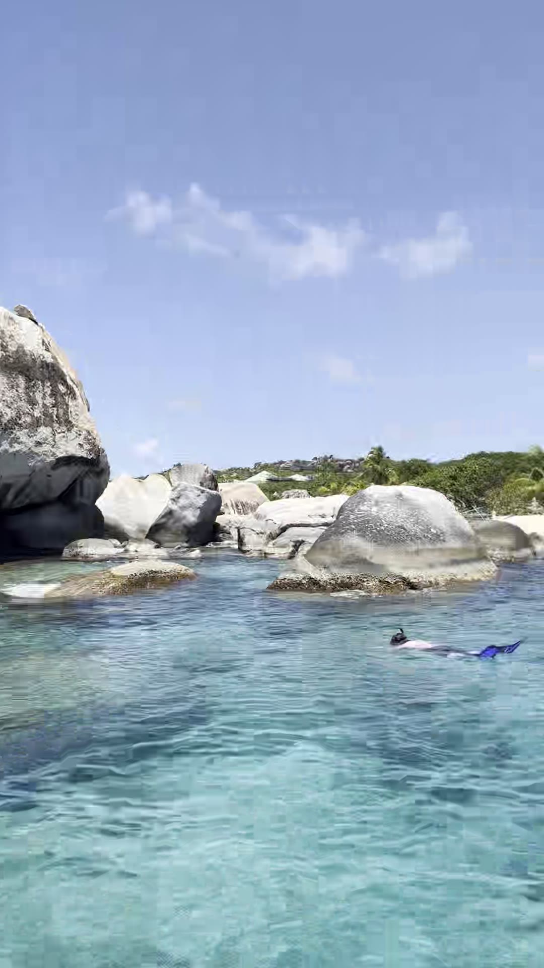 Snorkeler among the granite at The Baths, Virgin Gorda